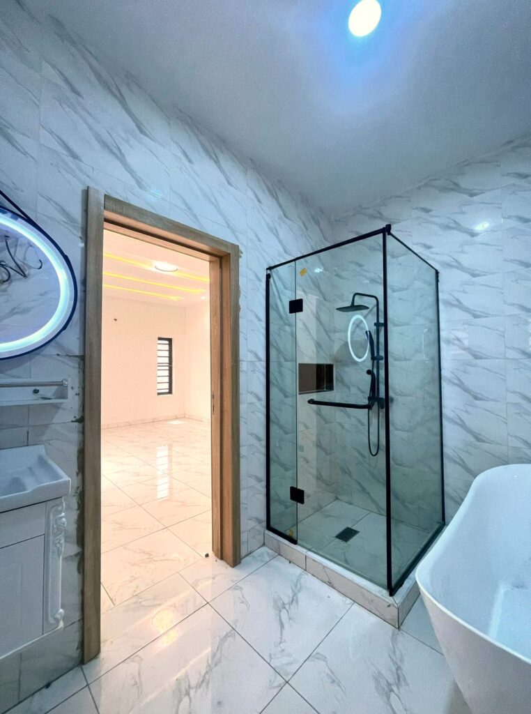 Ensuite with glass shower and bathtub, 4 bedroom semi-detached duplex in Abijo, Lekki