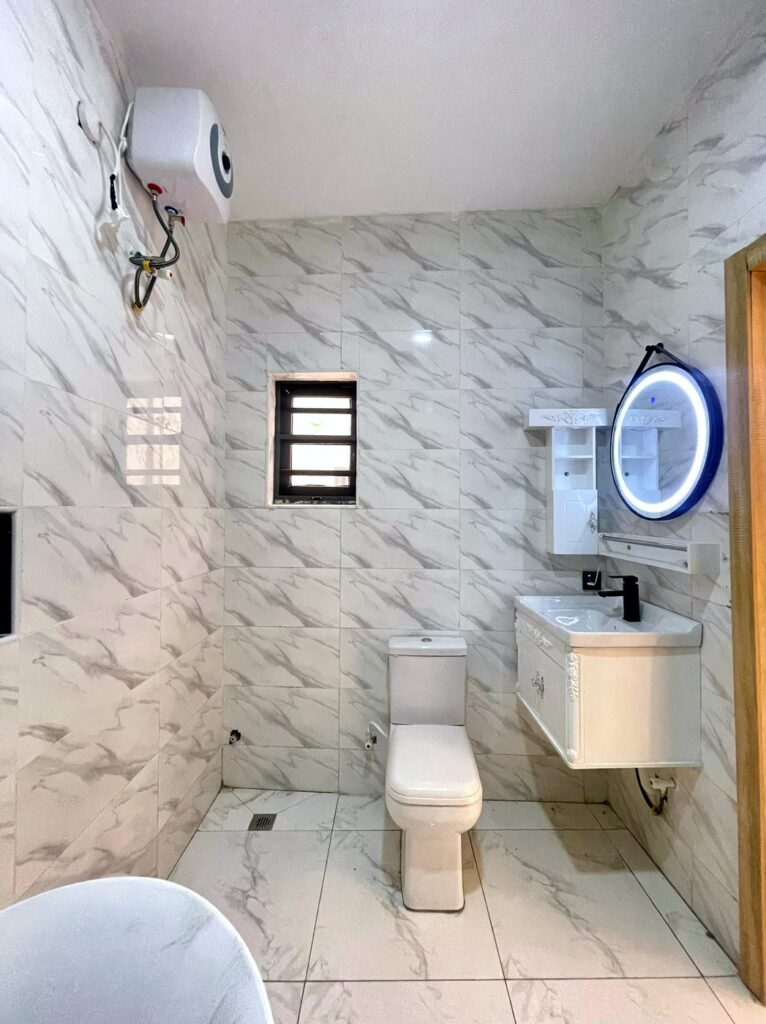 Ensuite bathroom with vanity and water heater, 4 bedroom semi-detached duplex in Abijo, Lekki
