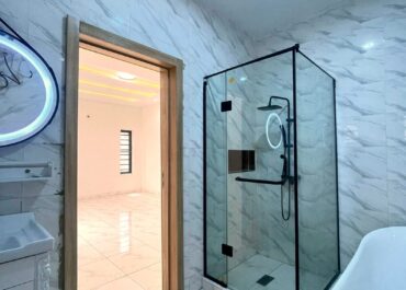 Ensuite bathroom with shower and bathtub, 5 bedroom detached duplex in Abijo, Lekki