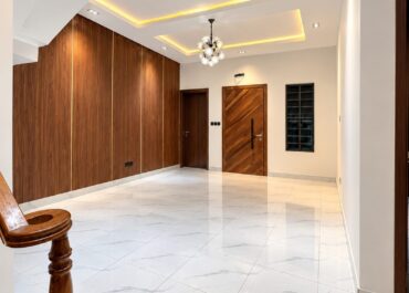 Living hall with wood feature wall, 4 bedroom terrace duplex, Sunshine Estate, Ajah