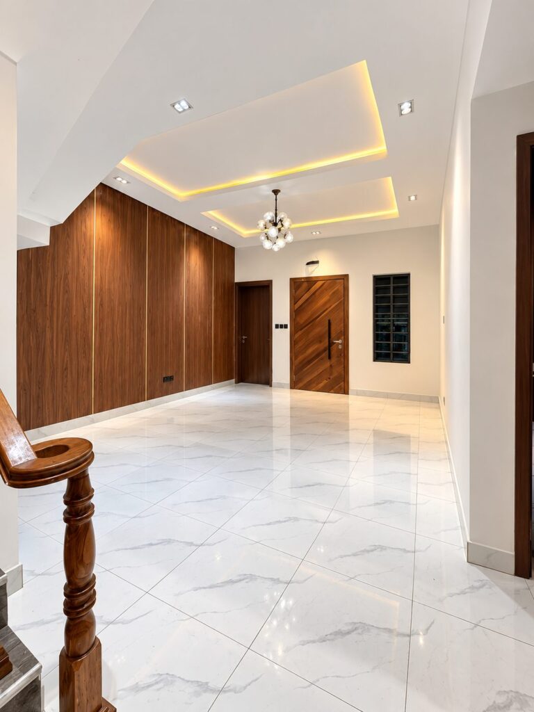 Living hall with wood feature wall, 4 bedroom terrace duplex, Sunshine Estate, Ajah